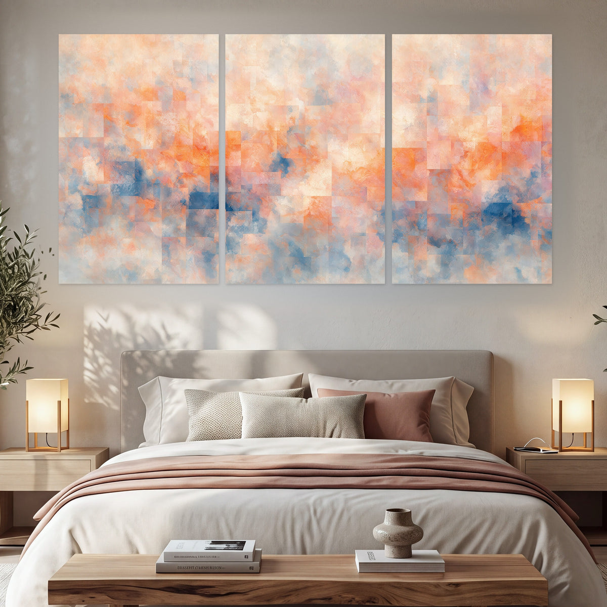 Peach and blue abstract painting set of 3 poster prints in a bedroom above the bed