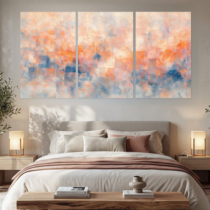 Peach and blue abstract painting set of 3 poster prints in a bedroom above the bed