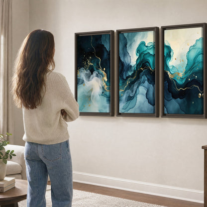 Teal and gold abstract painting 3 piece framed canvas in a living room