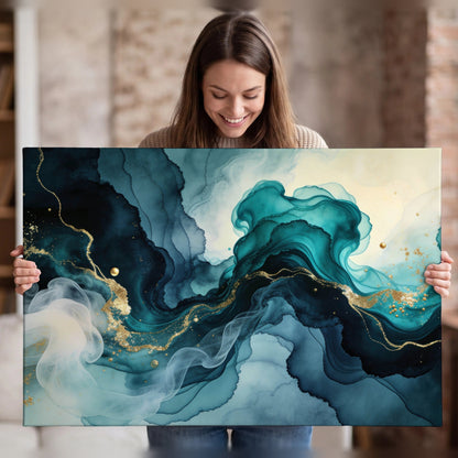 Teal and gold abstract painting canvas wall art held in hands