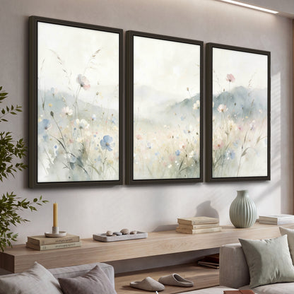 Watercolor wildflower meadow painting 3 piece framed canvas in a living room above a console