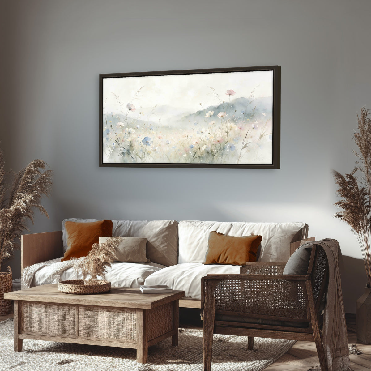 Watercolor wildflower meadow painting framed canvas wall art in a rustic living room