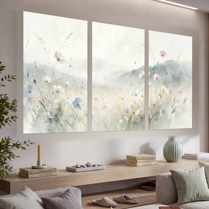 Watercolor wildflower meadow painting set of 3 poster prints in a living room above a console