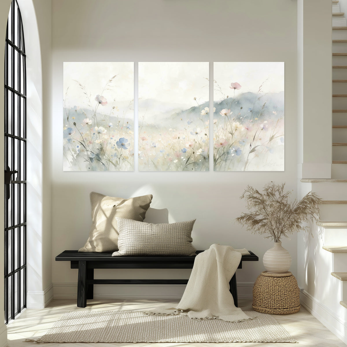 Watercolor wildflower meadow painting set of 3 poster prints in an entryway above a bench