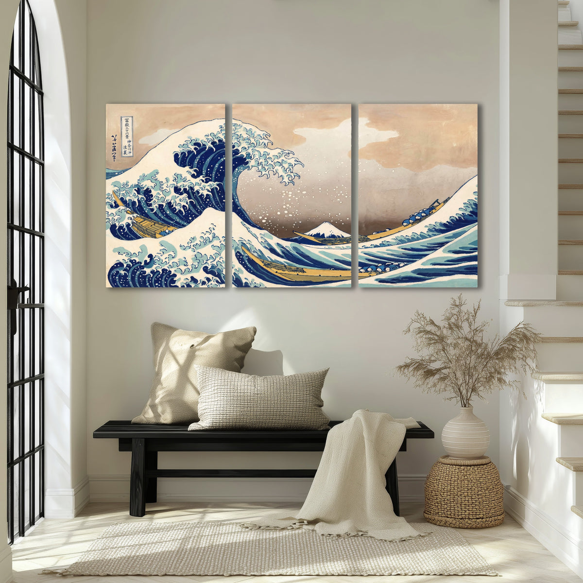 The Great Wave Japanese style painting 3 piece canvas wall art in an entryway above a bench