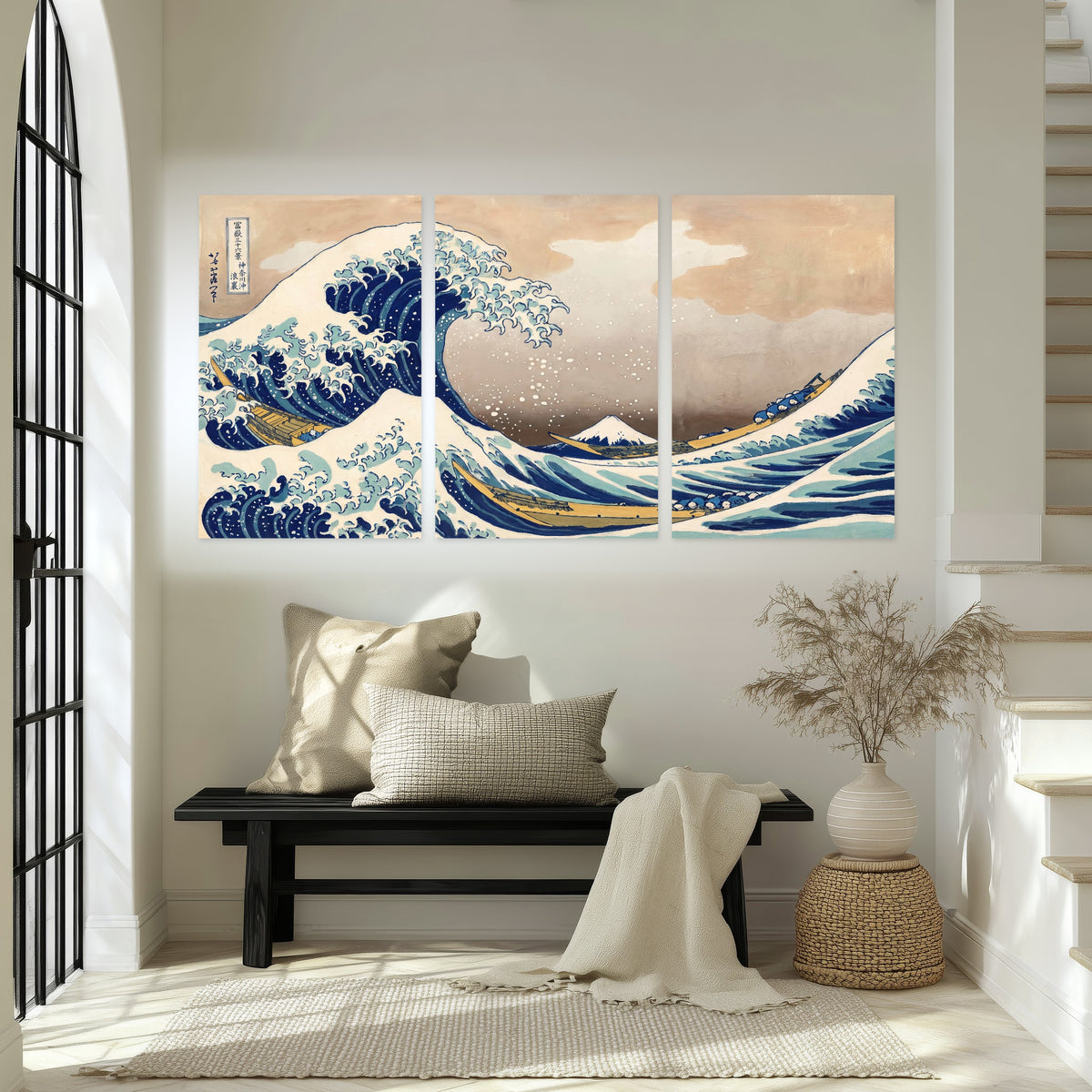 The Great Wave Japanese style painting set of 3 poster prints in an entryway above a bench