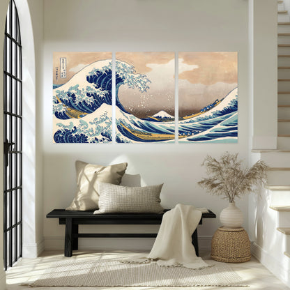 The Great Wave Japanese style painting set of 3 poster prints in an entryway above a bench