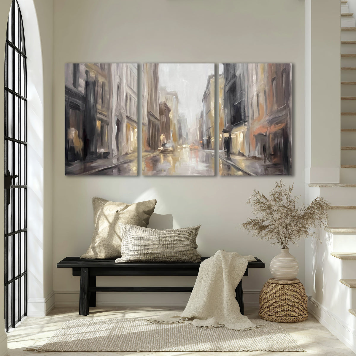 Rainy city street painting 3 piece canvas wall art in an entryway above a bench