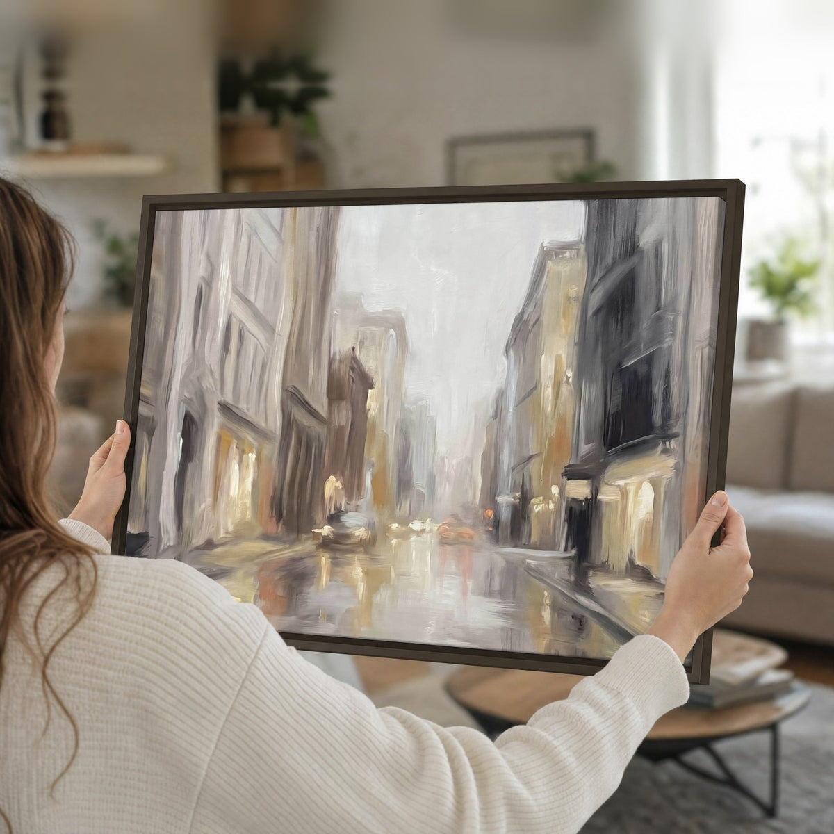 Rainy city street painting framed canvas held in hands