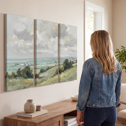 3 piece canvas wall art – coastal countryside oil painting above a sideboard in a bright living room