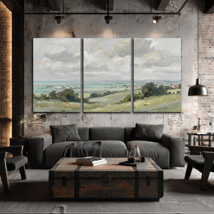 Coastal Countryside 3 piece canvas wall art set hanging in an industrial loft living room