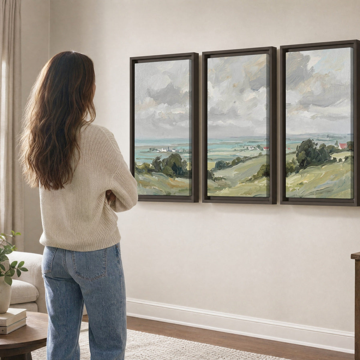3 piece framed canvas set – coastal countryside landscape in dark floating frames in a living room