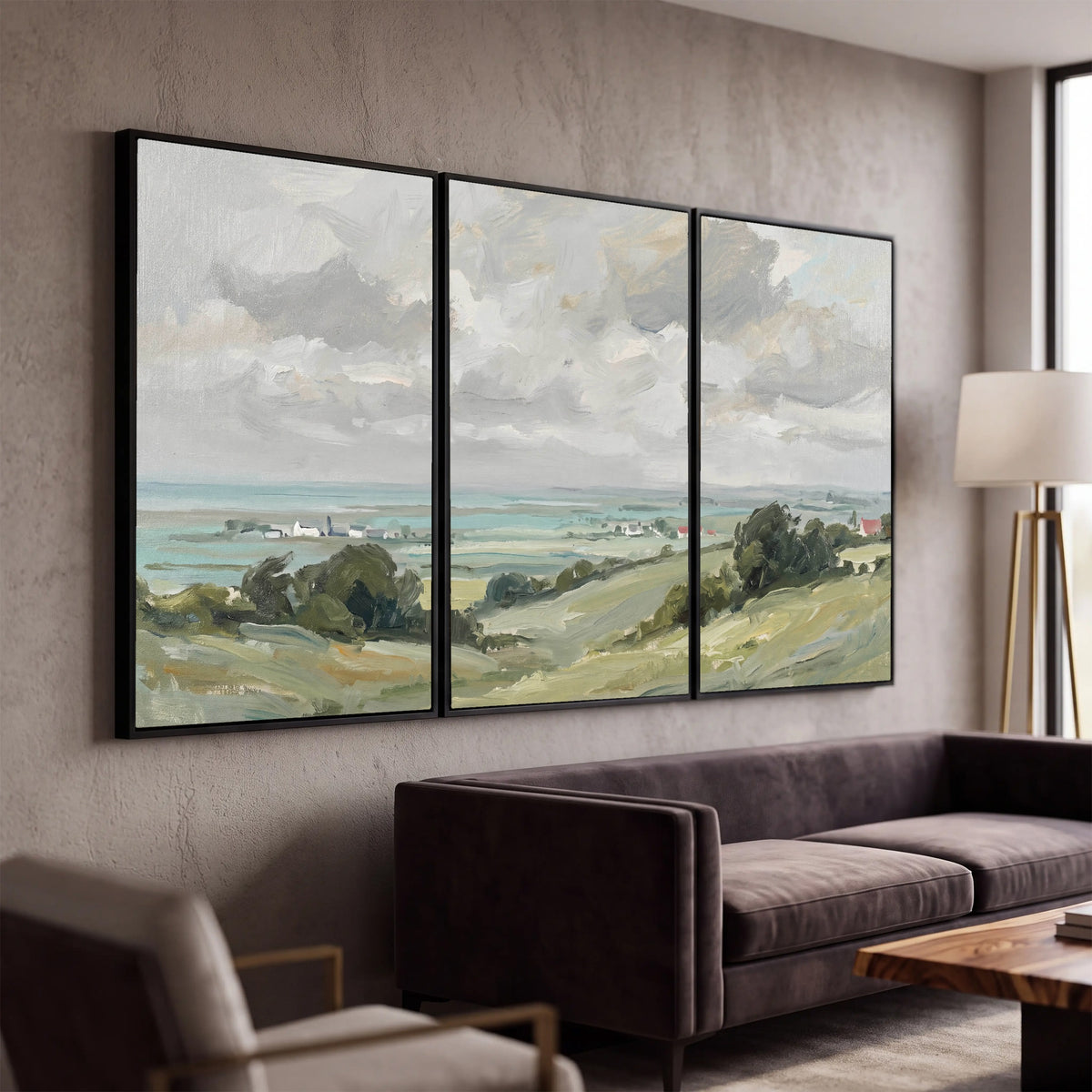Coastal Countryside 3 piece framed canvas wall art hanging in a modern living room