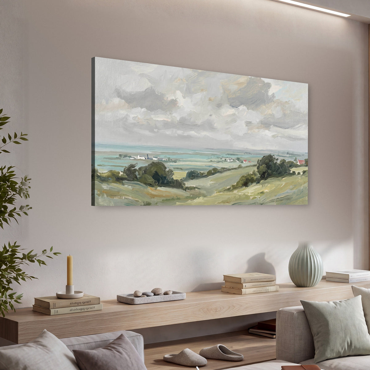 Coastal Countryside canvas wall art, single panoramic piece hanging in a living room with a long console