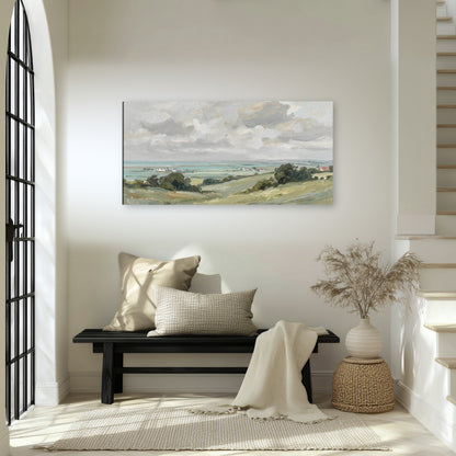 Coastal countryside canvas wall art in an entryway above a bench