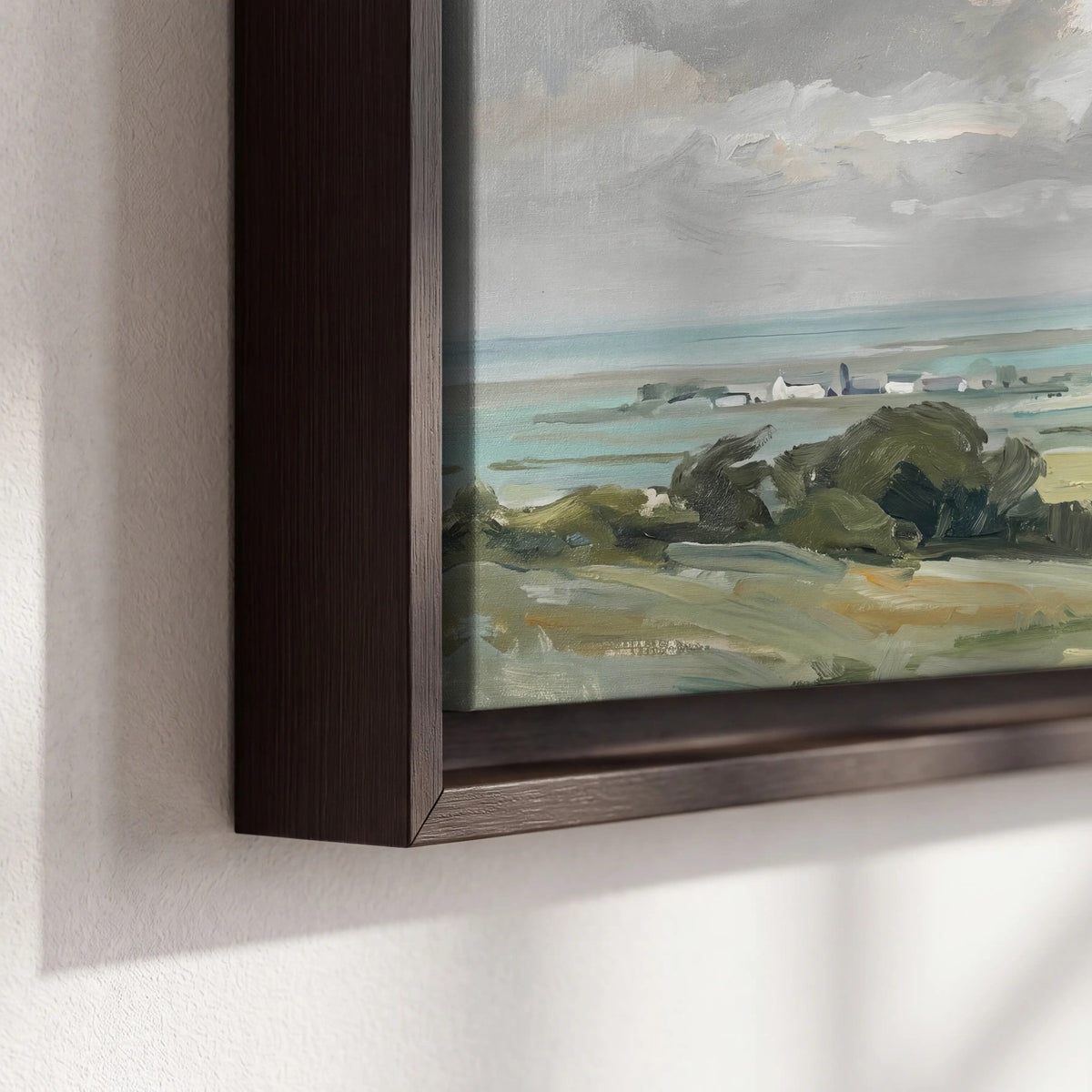Close-up of dark floating frame and canvas edge – framed coastal countryside oil painting print