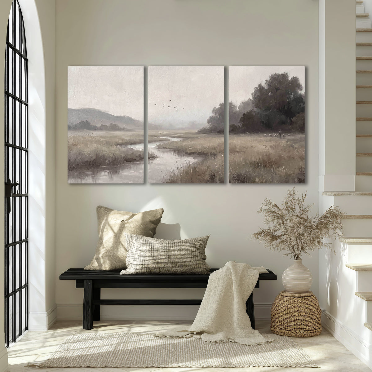 Misty meadow stream painting 3 piece canvas wall art in an entryway above a bench