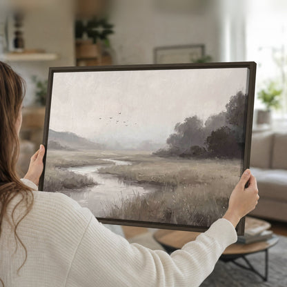 Misty meadow stream painting framed canvas held in hands