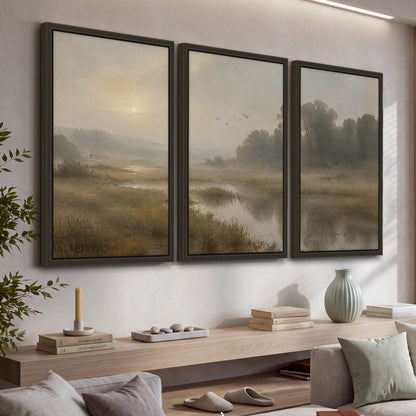 Golden marsh sunrise painting 3 piece framed canvas in a living room above a console