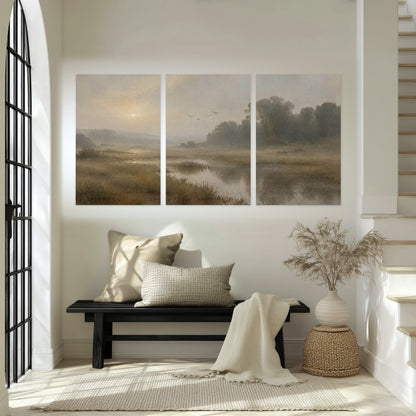 Golden marsh sunrise painting set of 3 poster prints in an entryway above a bench