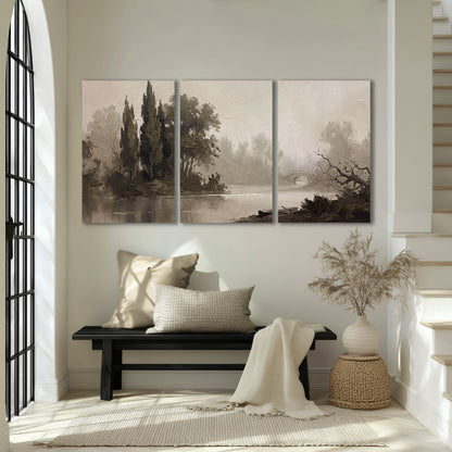 Misty river stone bridge painting 3 piece canvas wall art in an entryway above a bench