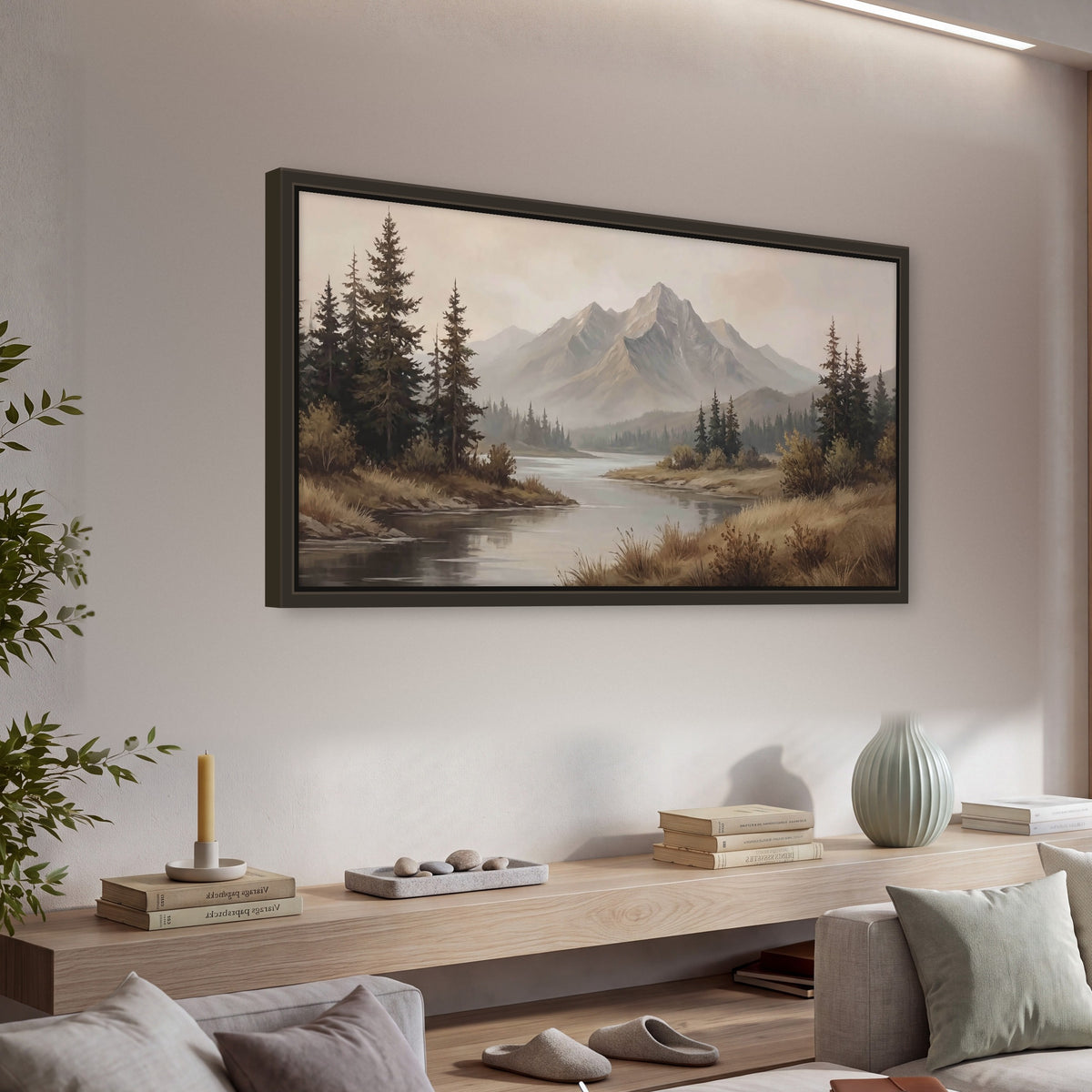Mountain lake with pines painting framed canvas wall art in a living room above a console