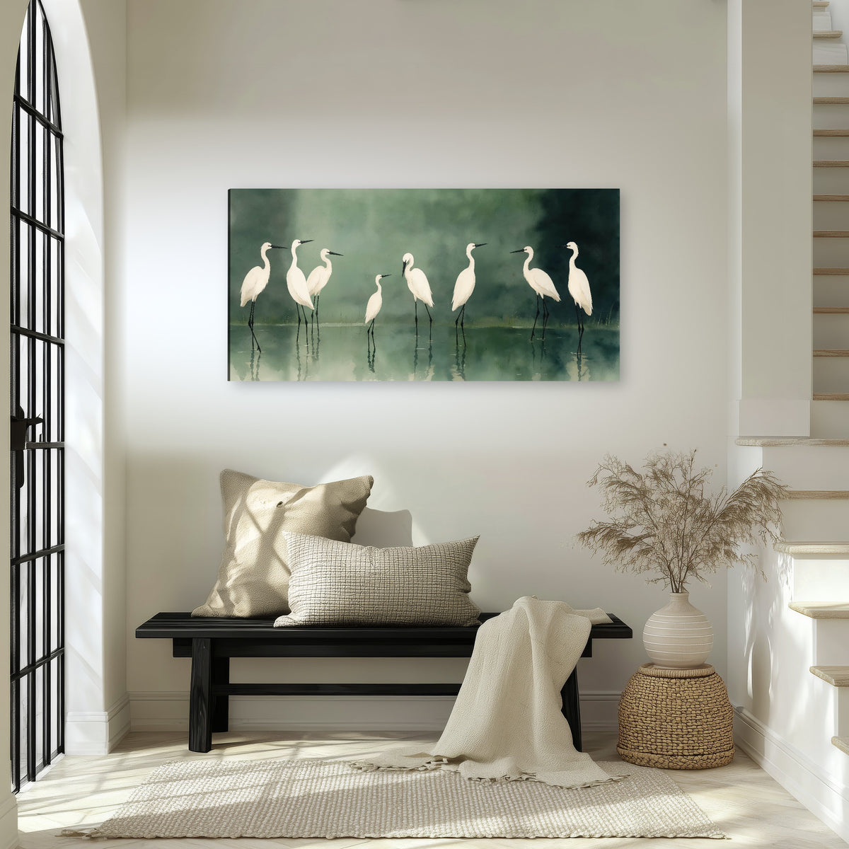 White egrets on green lake painting canvas wall art in an entryway above a bench