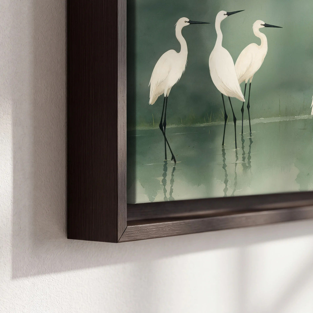 White egrets on green lake painting framed canvas close-up showing the floating frame