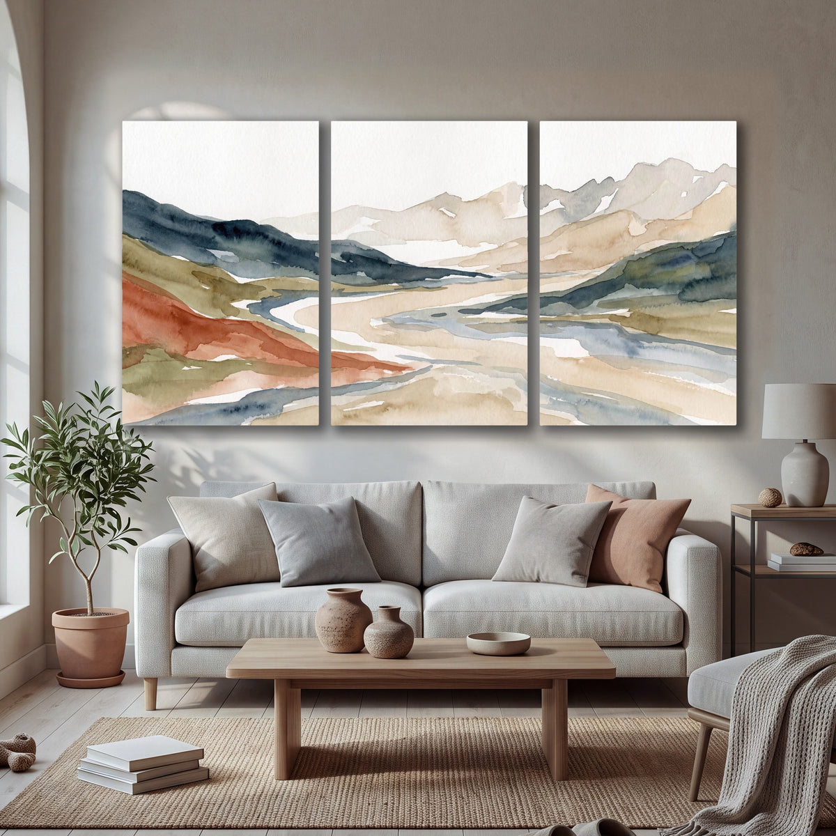 Watercolor mountain valley painting 3 piece canvas wall art in a bright living room