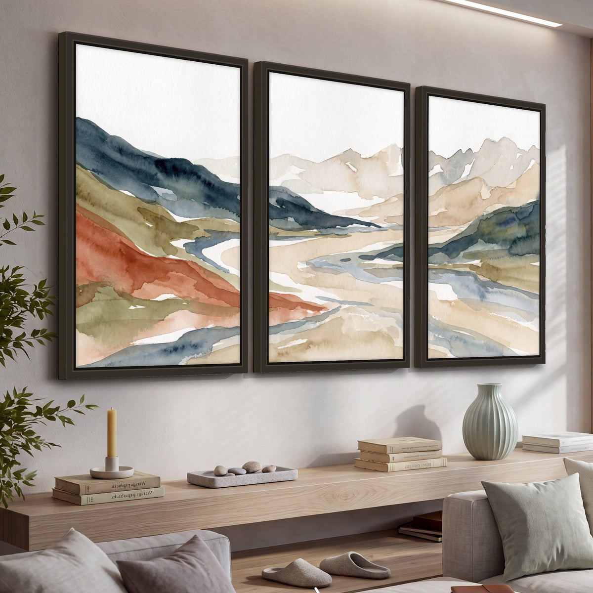 Watercolor mountain valley painting 3 piece framed canvas in a living room above a console