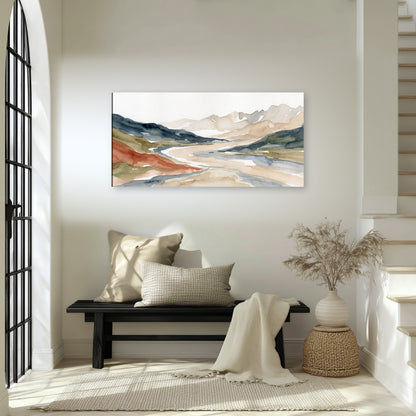 Watercolor mountain valley painting canvas wall art in an entryway above a bench