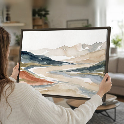 Watercolor mountain valley painting framed canvas held in hands