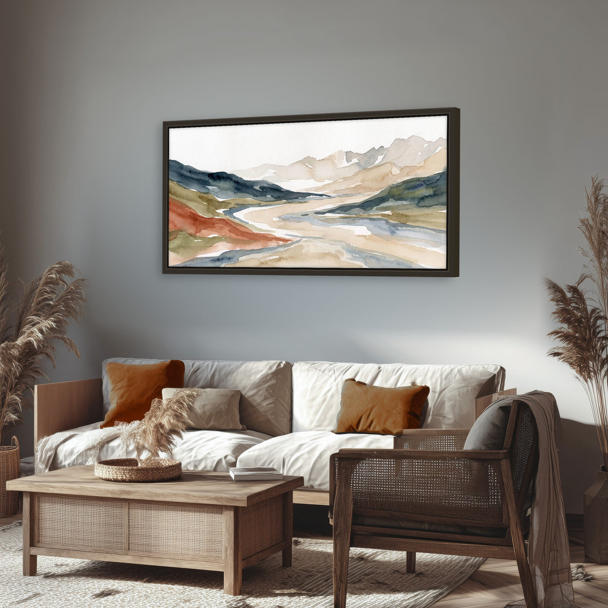 Watercolor mountain valley painting framed canvas wall art in a rustic living room