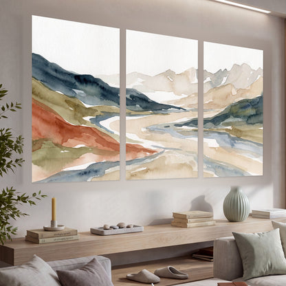 Watercolor mountain valley painting set of 3 poster prints in a living room above a console