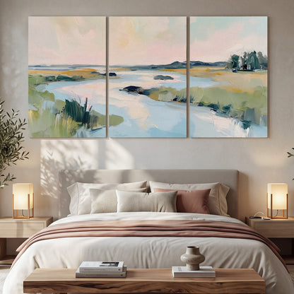 Pastel marsh river painting 3 piece canvas wall art in a bedroom above the bed