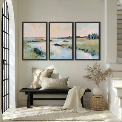 Pastel marsh river painting 3 piece framed canvas in an entryway above a bench