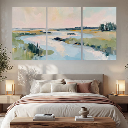 Pastel marsh river painting set of 3 poster prints in a bedroom above the bed