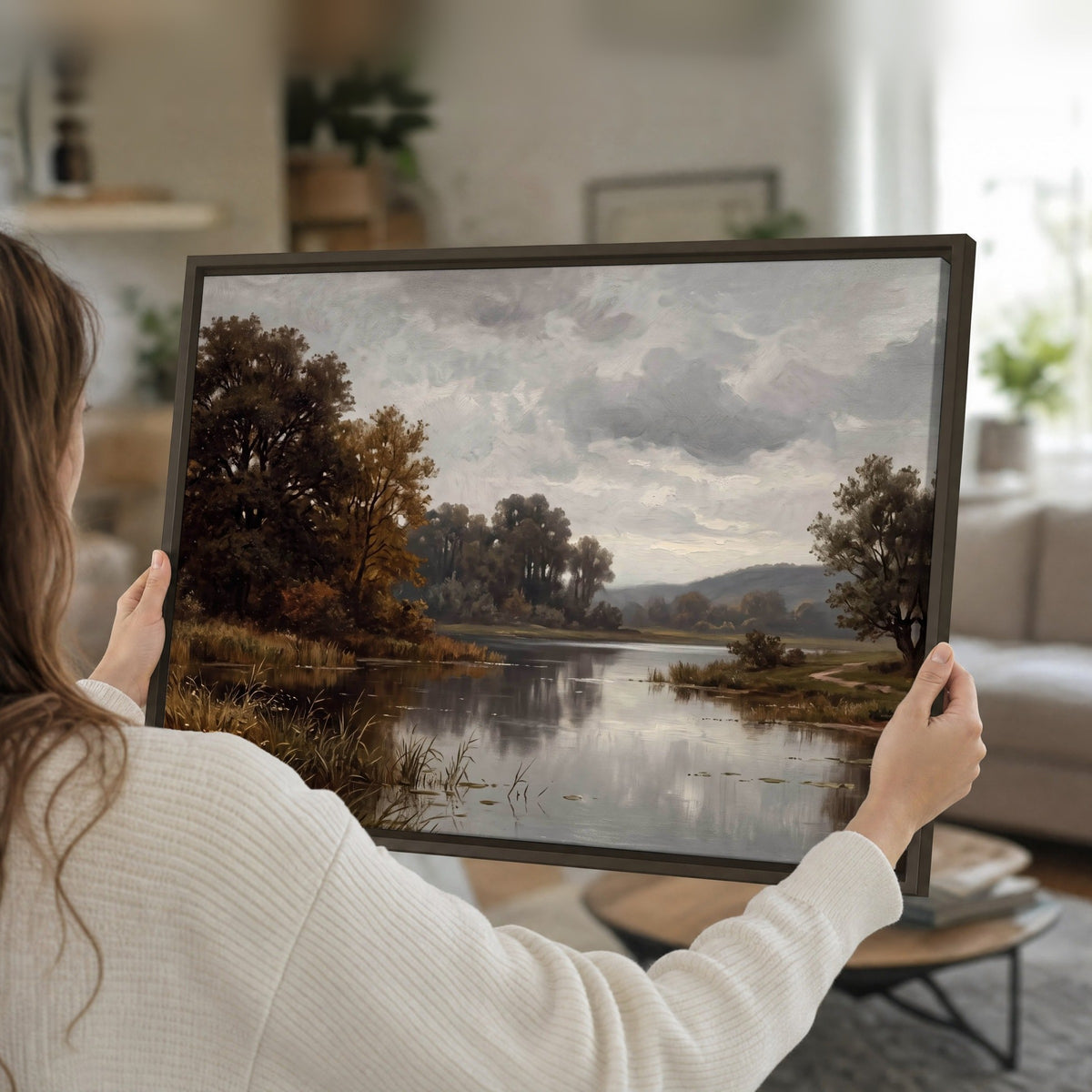 Autumn river landscape painting framed canvas held in hands