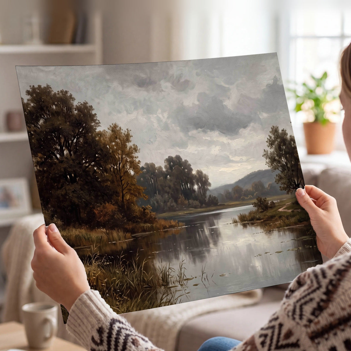 Autumn river landscape painting poster print held in hands