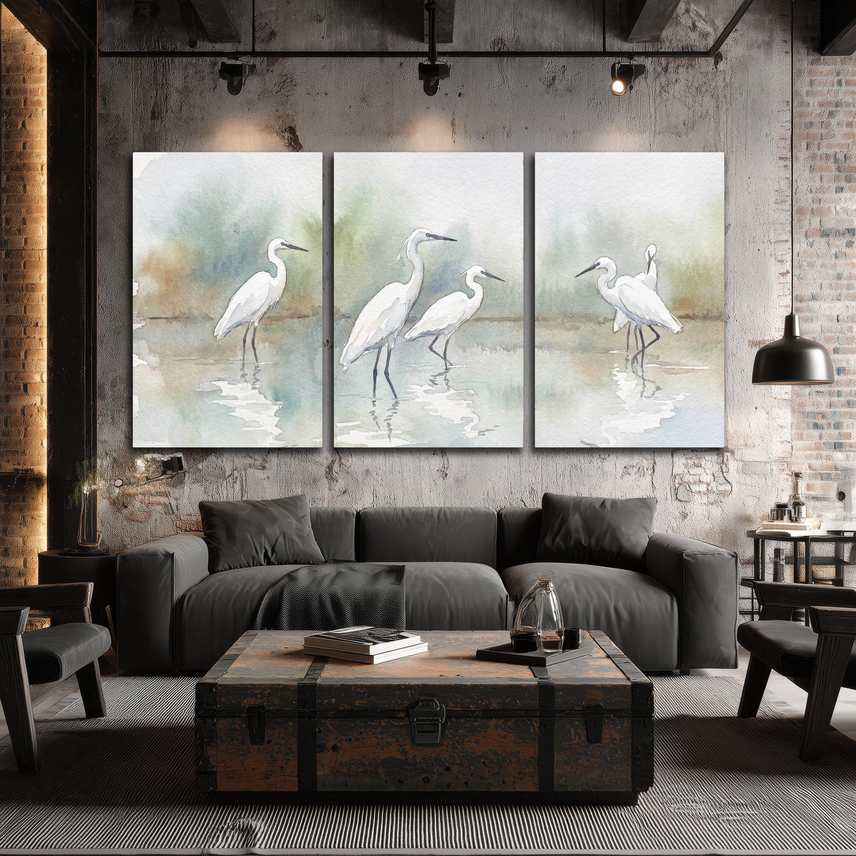 White egrets watercolor 3 piece canvas wall art in an industrial loft