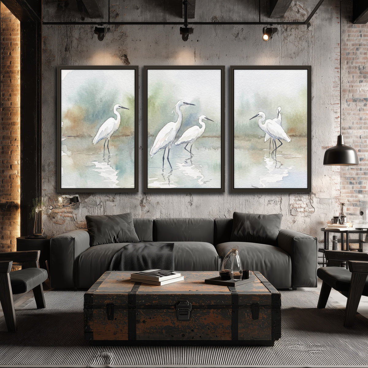 White egrets watercolor 3 piece framed canvas in an industrial loft