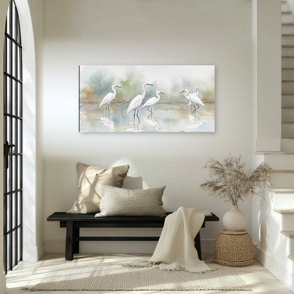 White egrets watercolor canvas wall art in an entryway above a bench