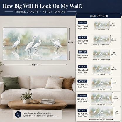 White egrets watercolor canvas wall art size guide above a sofa