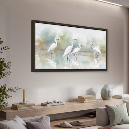 White egrets watercolor framed canvas wall art in a living room above a console