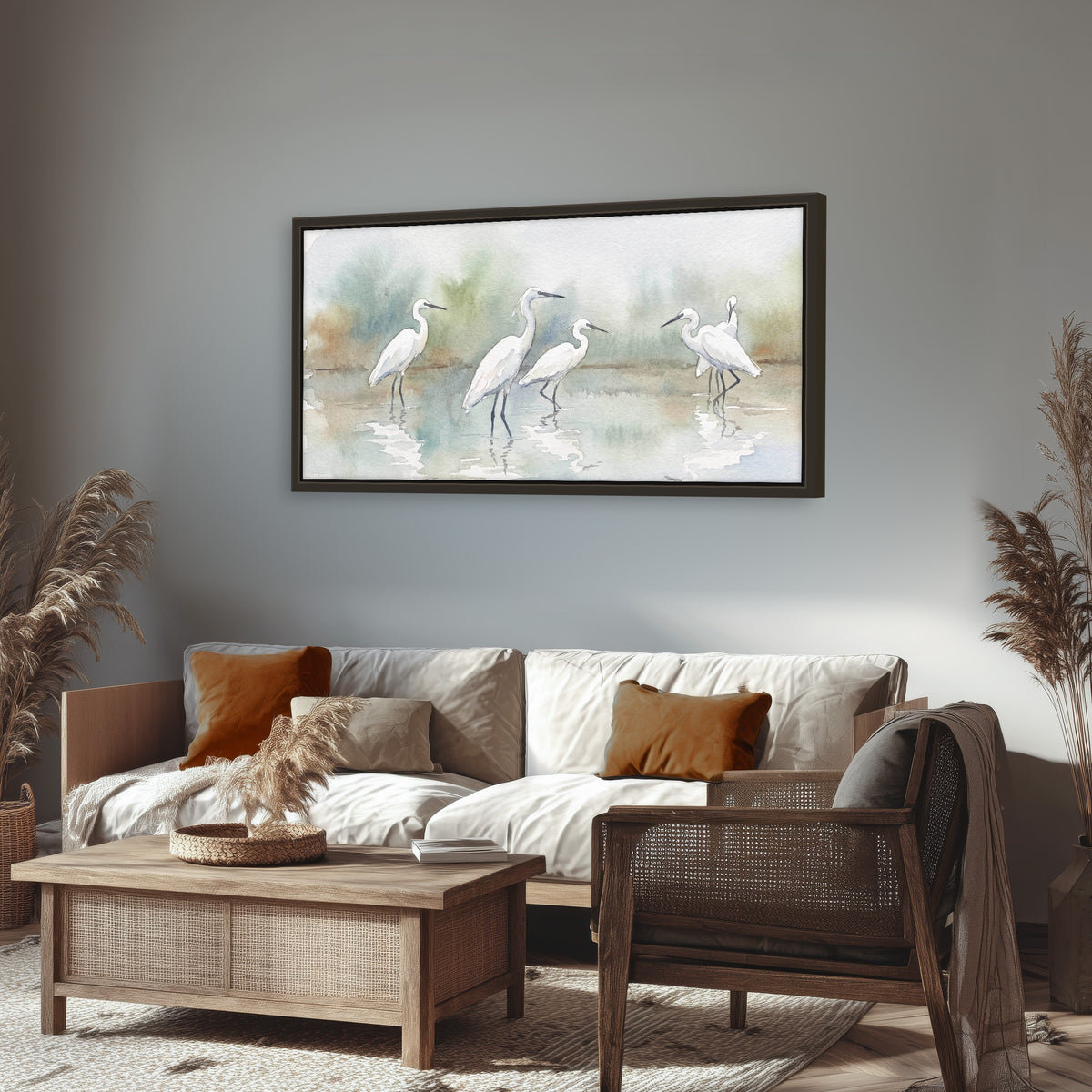 White egrets watercolor framed canvas wall art in a rustic living room