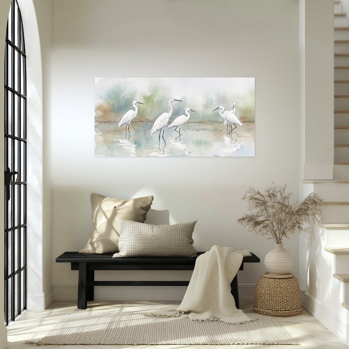 White egrets watercolor poster print in an entryway above a bench
