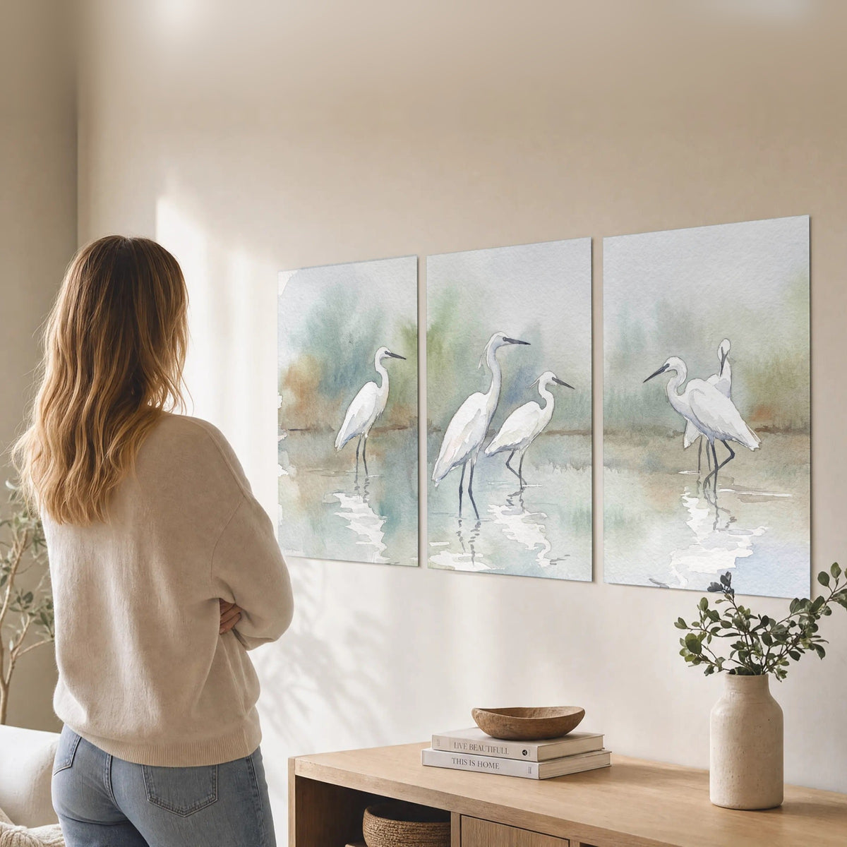 White egrets watercolor set of 3 poster prints in a living room