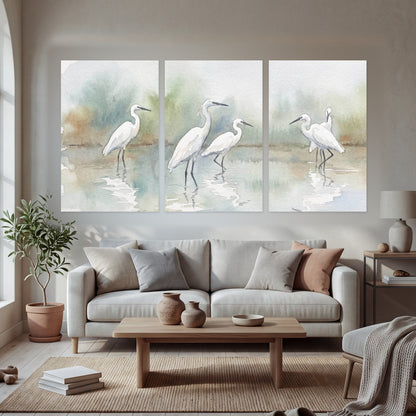 White egrets watercolor set of 3 poster prints in a bright living room