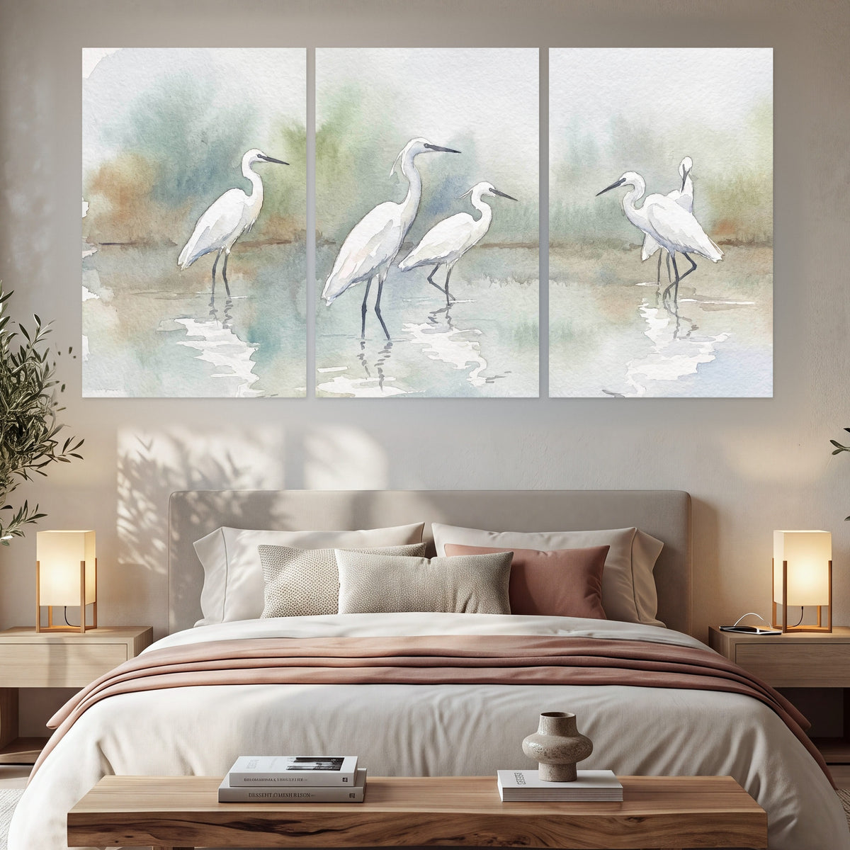White egrets watercolor set of 3 poster prints in a bedroom above the bed