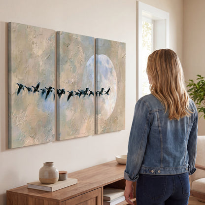 Geese flying across the moon painting 3 piece canvas wall art in a living room